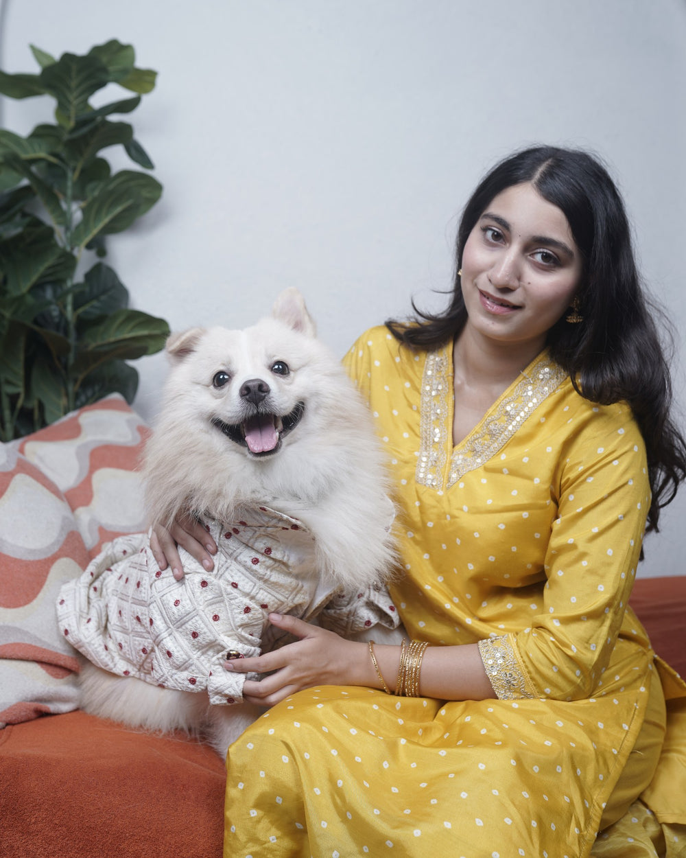 Laal Bindi dog kurta on an Indian Spitz