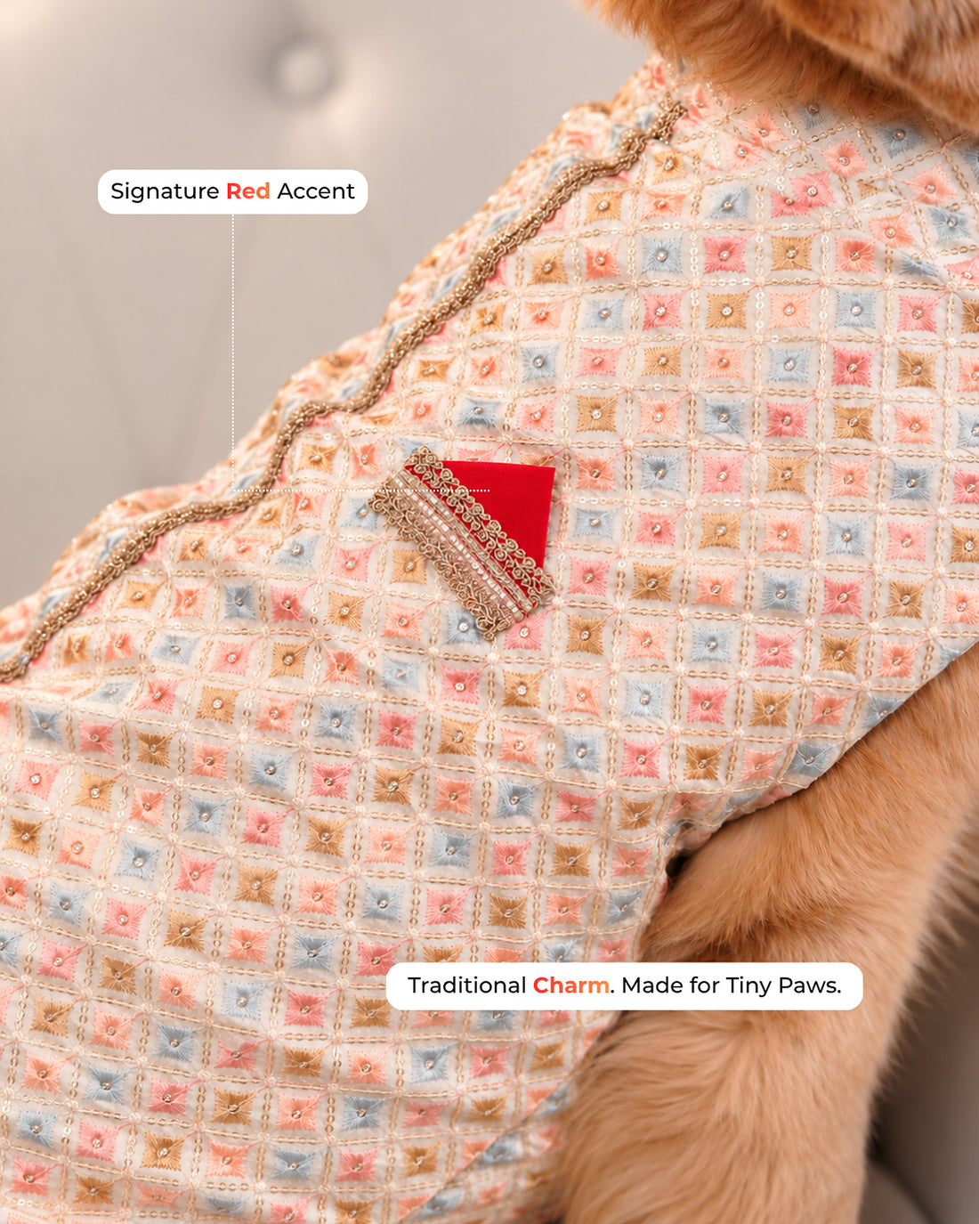 Close up of the Intricate Pastel Embroidery dog kurta: pink, blue and mustard square embroidery with sequins, gold zari trim and a red accent with gold lace